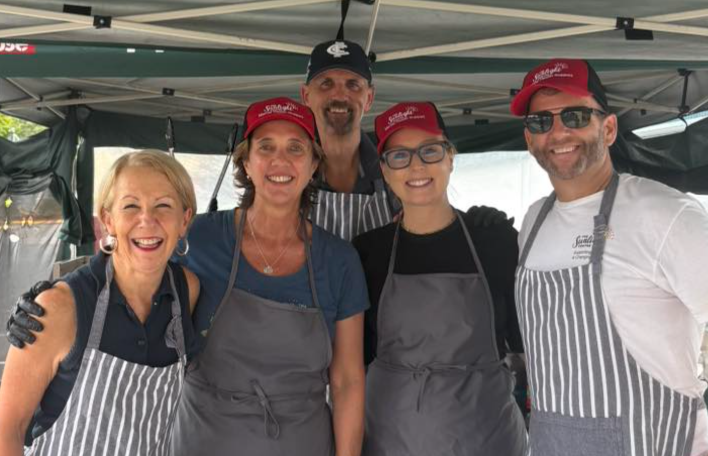 volunteers and Ken and Di Farmer at Bunnings sausage sizzle fundraiser